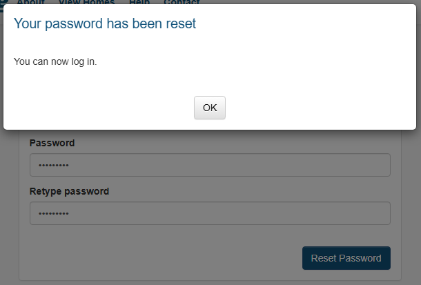 The image shows a pop-up box that states 'Your password has been reset' and 'You can now login'. There is an 'OK' button to close it.